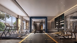 A gym with treadmills, weight machines, and a mirrored wall. - Voco Chengdu Movie Metropolis By Ihg (Chengdu)