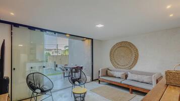 Basic Villa | Living area | 40-inch Smart TV with digital channels