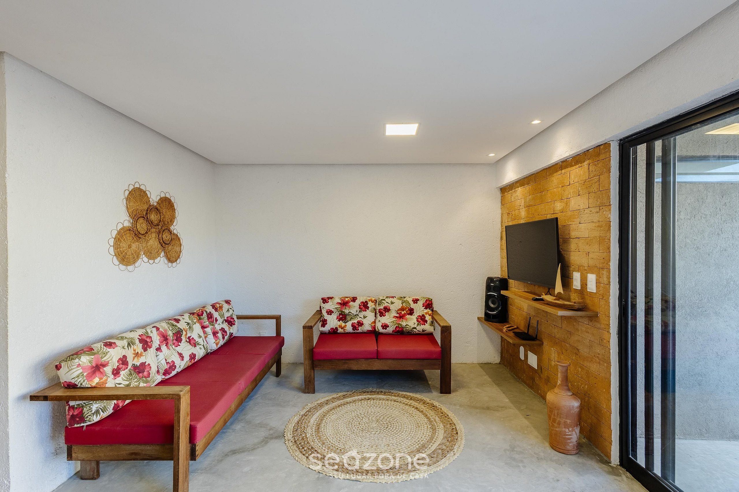 Basic Villa | Living area | 40-inch TV with digital channels