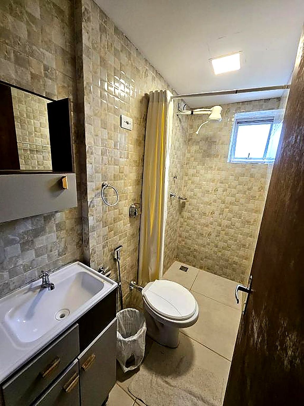Shower, towels, soap, toilet paper