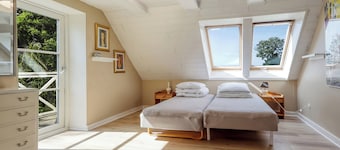Holiday home with sea view and activity room