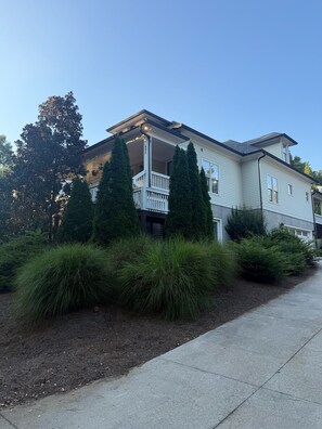 A two-story house with a covered porch and a visible address number. - Marvelous 5-bedroom house with tons of space in 5 Points (Athens)