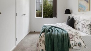 Unclassified image, 3 of 6, button - Cozy room in a newly built modern house. (Pukekohe)