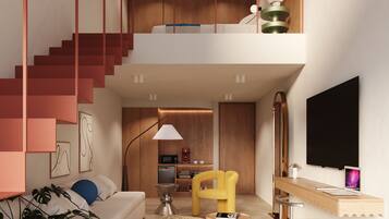 A modern interior with a staircase, a sofa, a coffee table, and a TV.