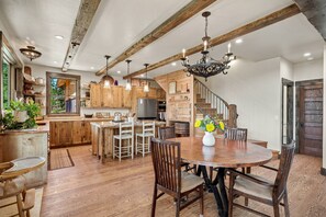 A spacious kitchen with wooden cabinets, a central island, and pendant lighting. - Fall Escape Special: 15% Discount Ends Nov 30! Must book by Oct 18 (Pagosa Springs)