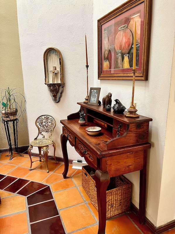 A traditional wooden desk with drawers, a lamp, and decorative items. - Delightful 3-bedroom house with pool, AC near Marina & Beach in Puerto Vallarta (Puerto Vallarta)