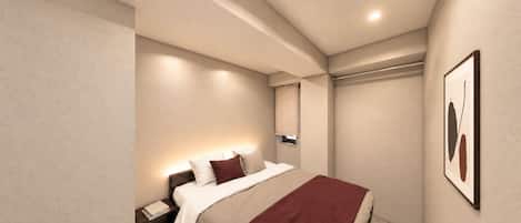 Una habitación de hotel moderna con cama, mesita de noche y un cuadro en la pared.
