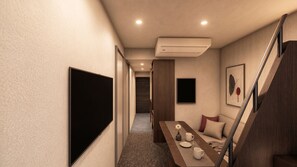 A modern interior with a flat-screen TV, a dining area with a table set, and a staircase. - Minn Ueno Uguisudani (Tokyo)