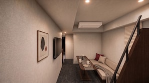 A modern interior with a sofa, a coffee table, and a TV. - Minn Ueno Uguisudani (Tokyo)