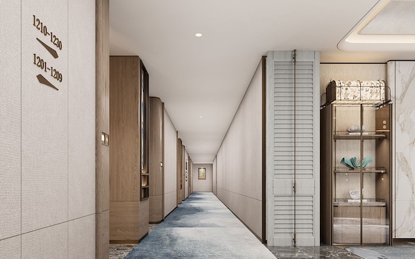 A hotel corridor with numbered doors, wooden paneling, a marble wall, and a built-in shelf with decorative items. - Yiwu Ocean Hotel (Jinhua)