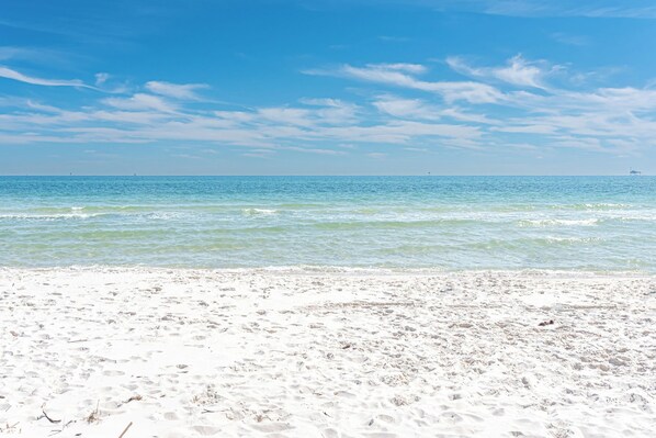 A beach with clear skies and calm waters. - 5002 Rookery 1/4 mile beach 2 pools (Gulf Shores)