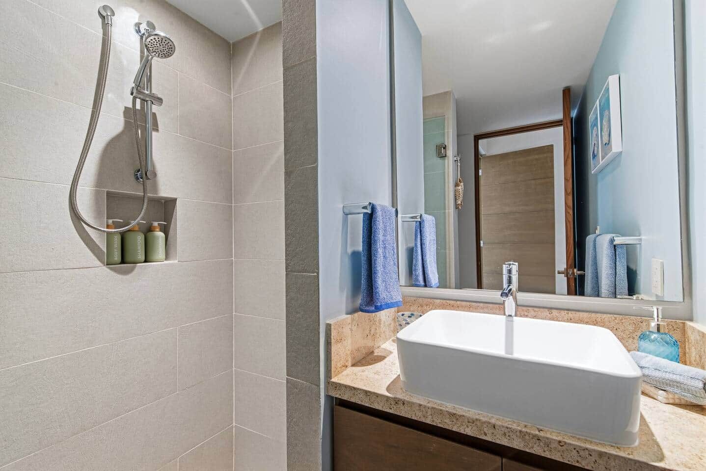 Shower, hair dryer, towels, soap