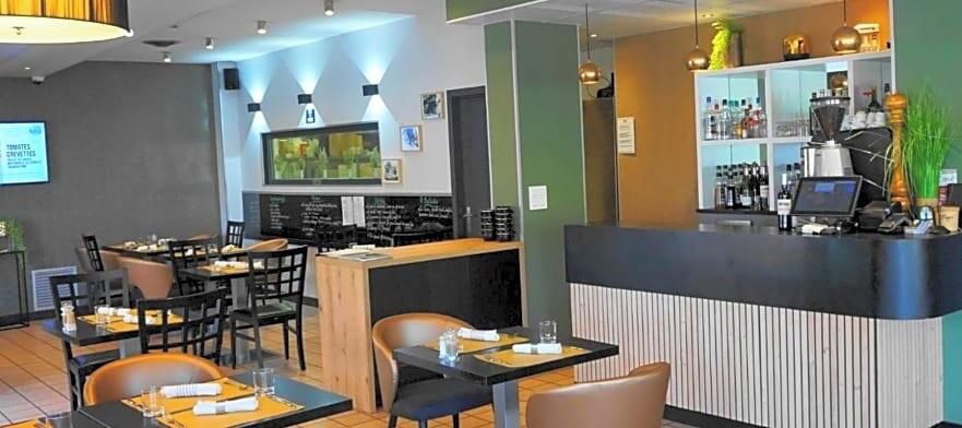 A restaurant with a counter, tables, chairs, and a bar area.