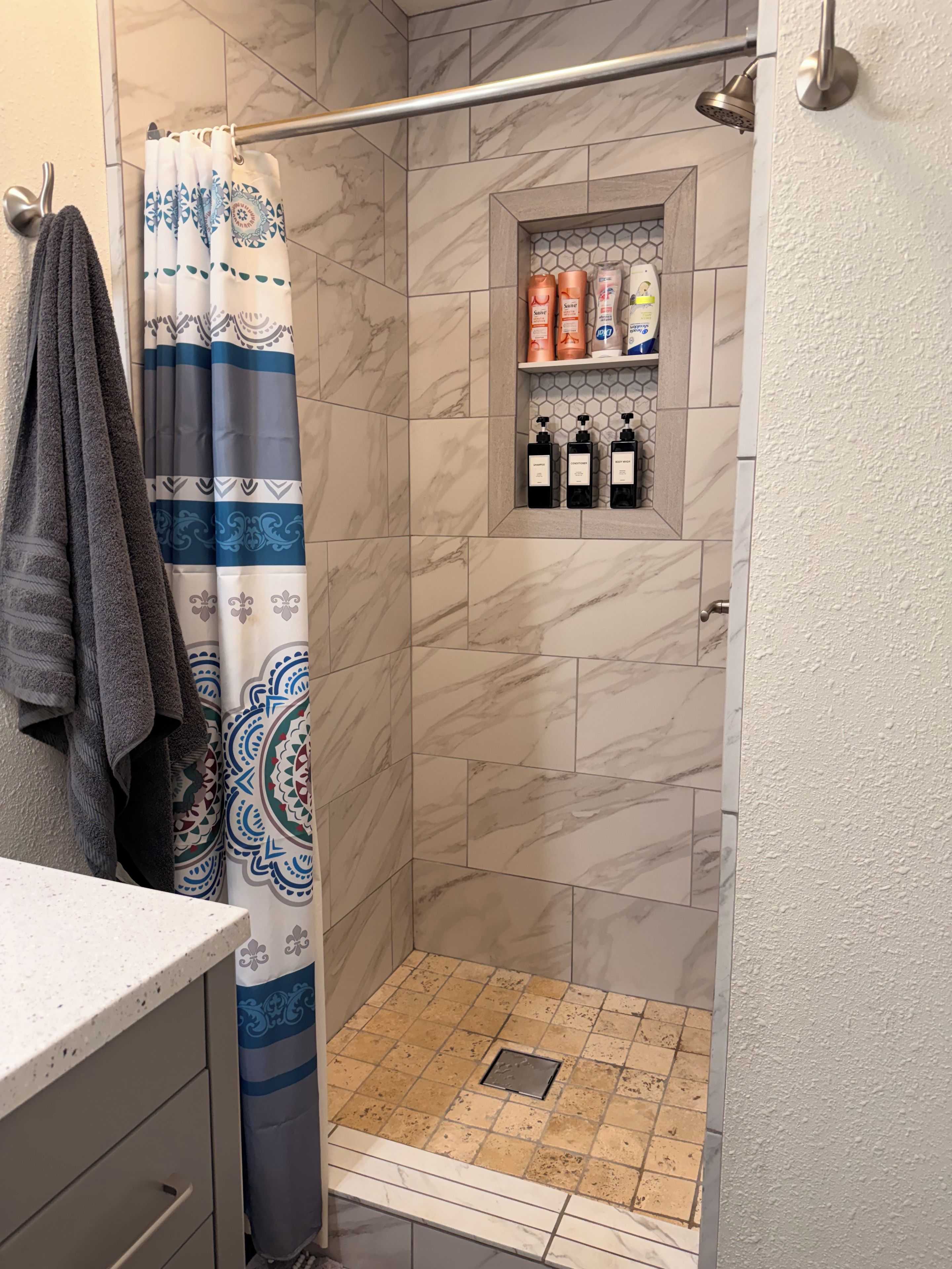 Shower, towels, soap, toilet paper