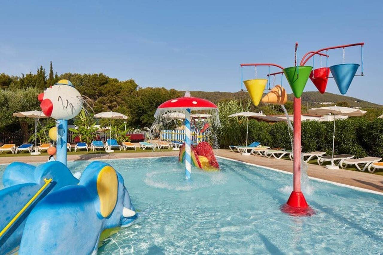 A water park with slides and a pool.