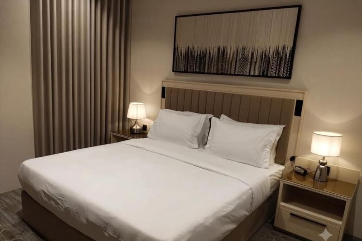 Junior Suite | In-room safe, blackout curtains, soundproofing, iron/ironing board