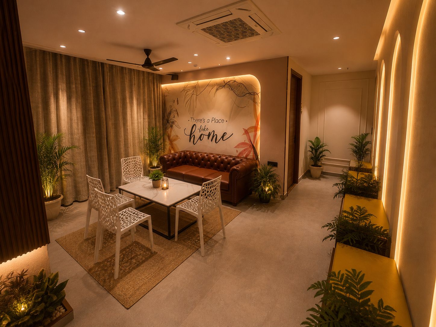 Una sala moderna con un sofá, una mesa de comedor con sillas y plantas decorativas.