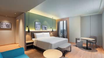 Executive Room | Premium bedding, down duvets, memory-foam beds, desk