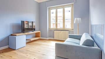 Departamento, balcón, vista a la ciudad | Área de sala de estar