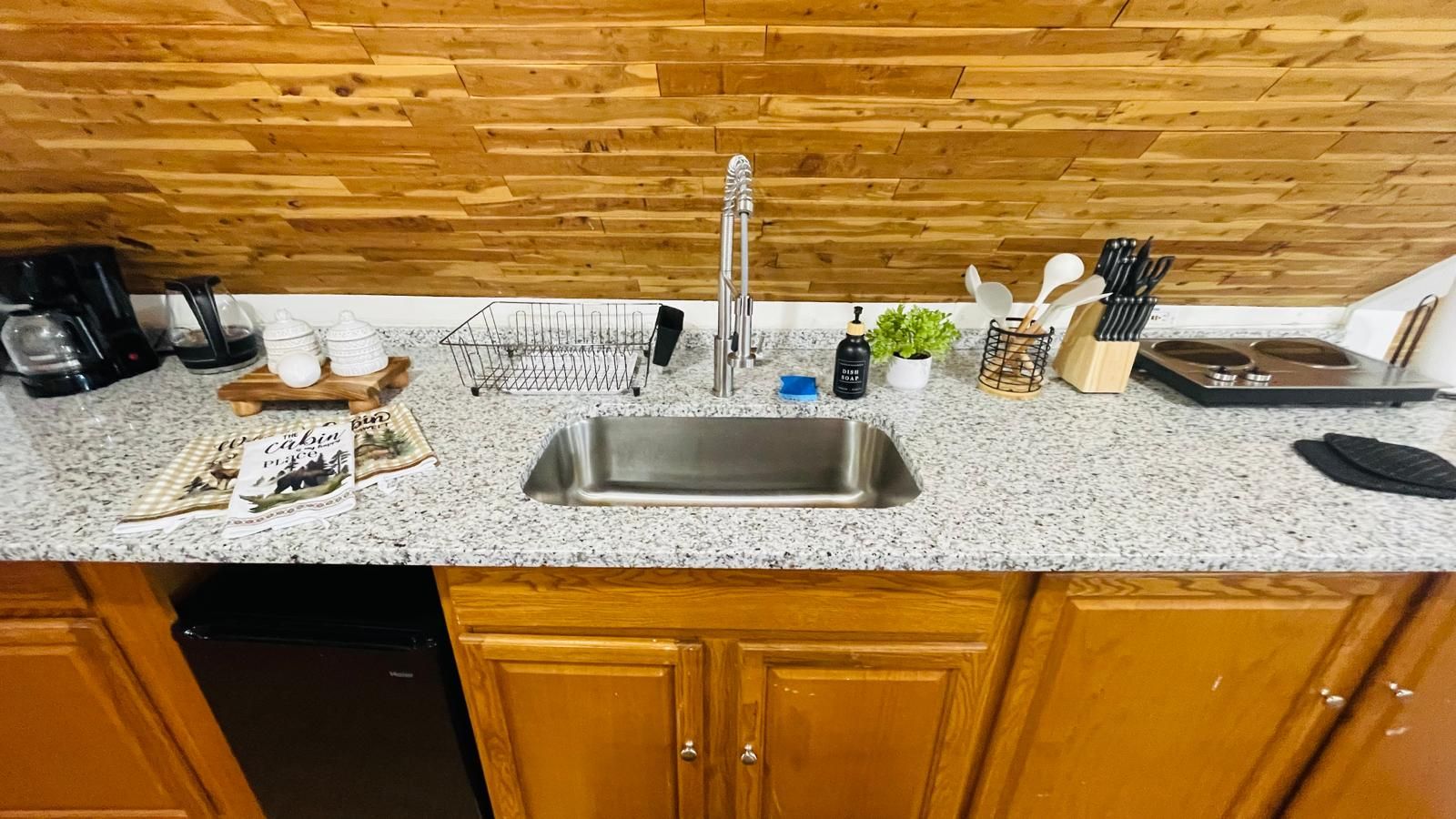 Coffee/tea maker, fridge, toaster, cookware/dishes/utensils