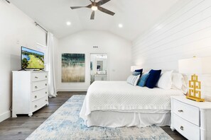 A bedroom with a bed, dresser, television, and a ceiling fan. - NEW Listing*Book 3 Nights Get 1 Free/See Description*Golf Cart*Beach/Pool Access (Miramar Beach)