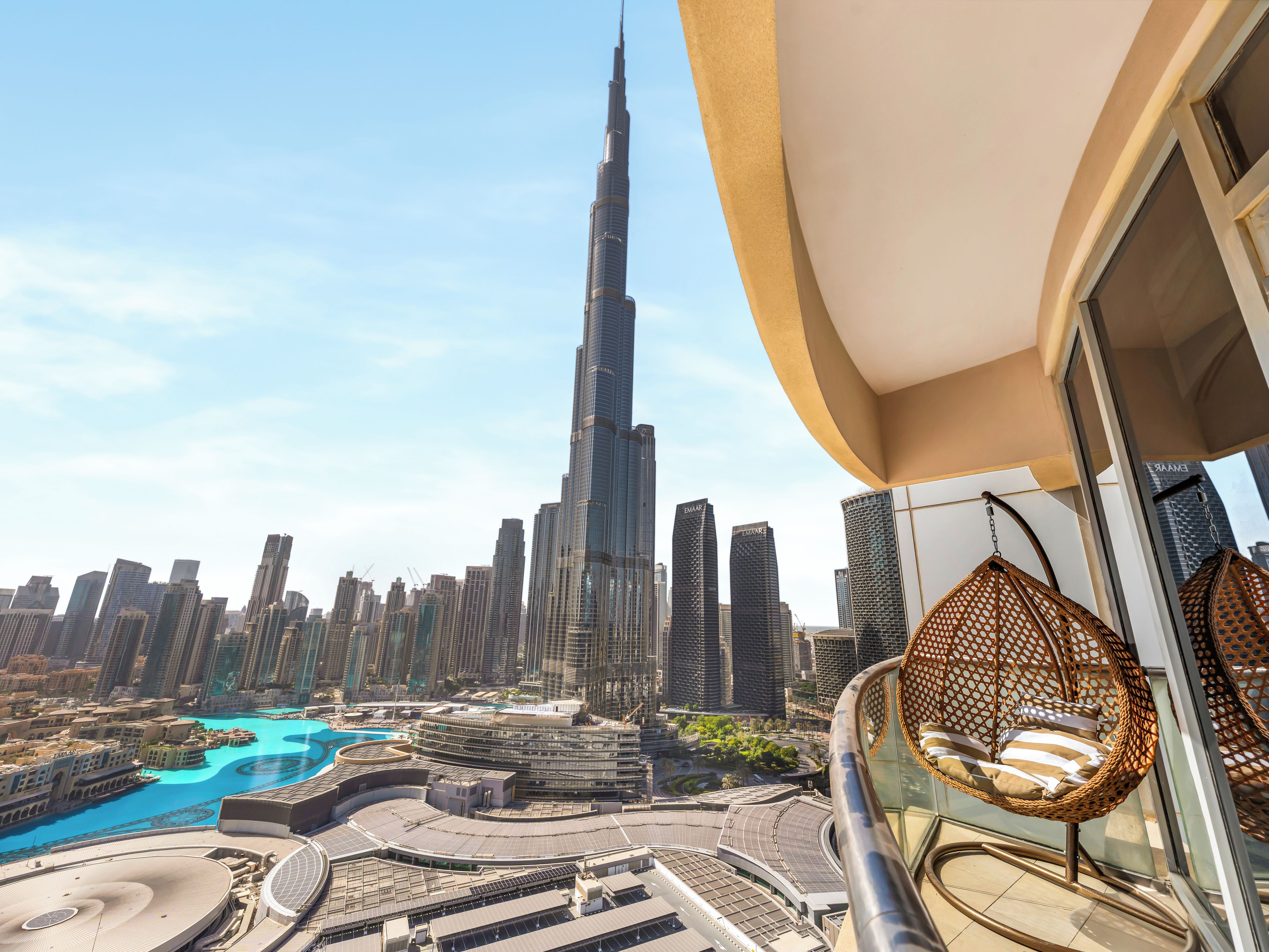 A high-rise building with a view of the Burj Khalifa and surrounding skyscrapers.