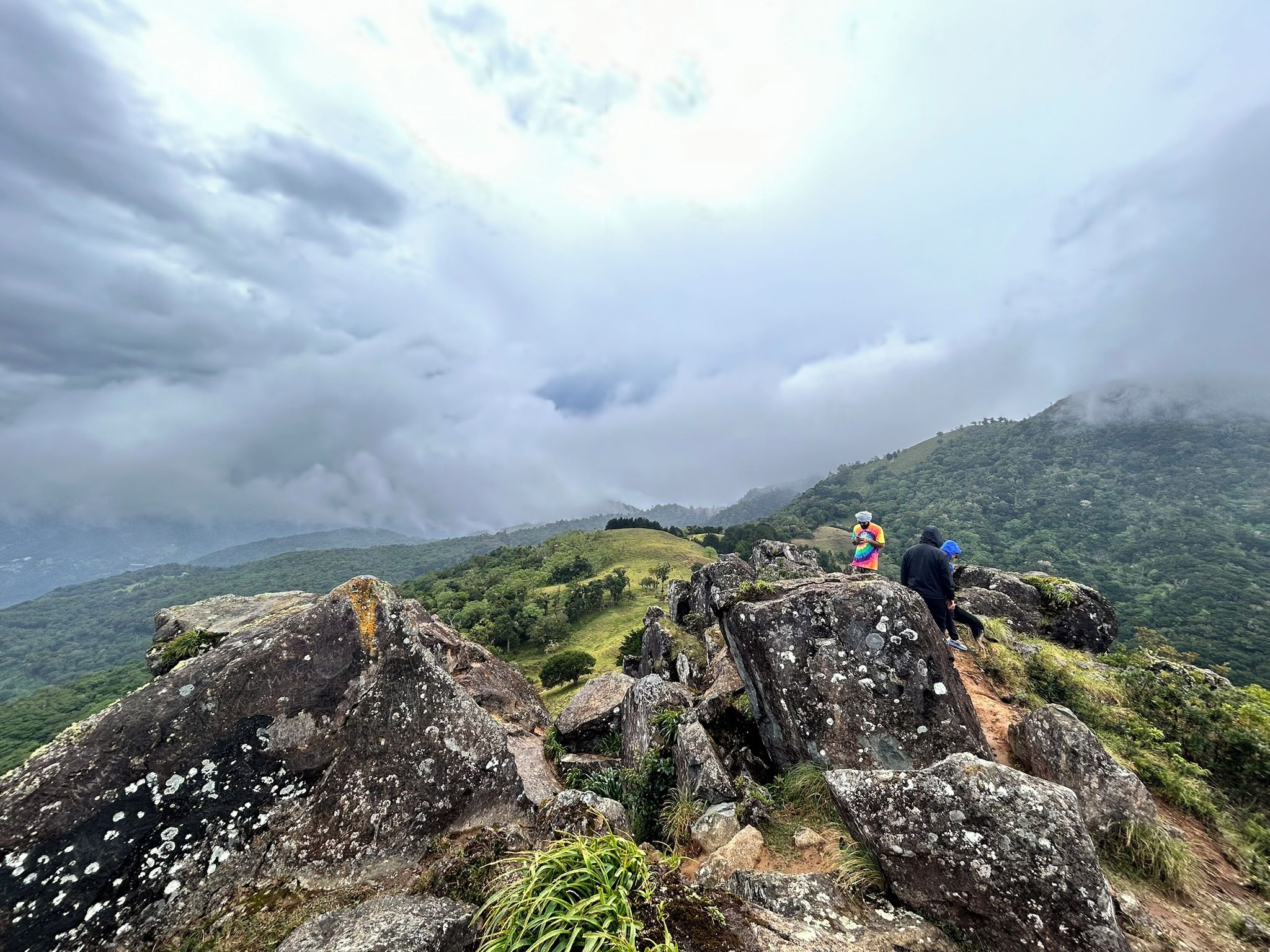 A mountainous landscape with rocky terrain and a path.