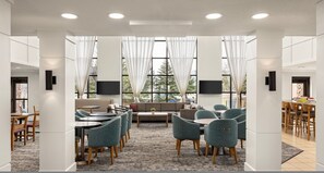 Dining area off the Great Room — where the free breakfast buffet is served each morning - 2BR Accessible Suite | Free Daily Breakfast + Pool (Bloomington)