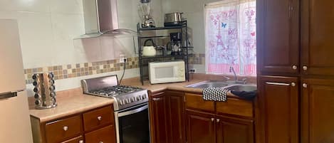 Coffee/tea maker, fridge, microwave, toaster