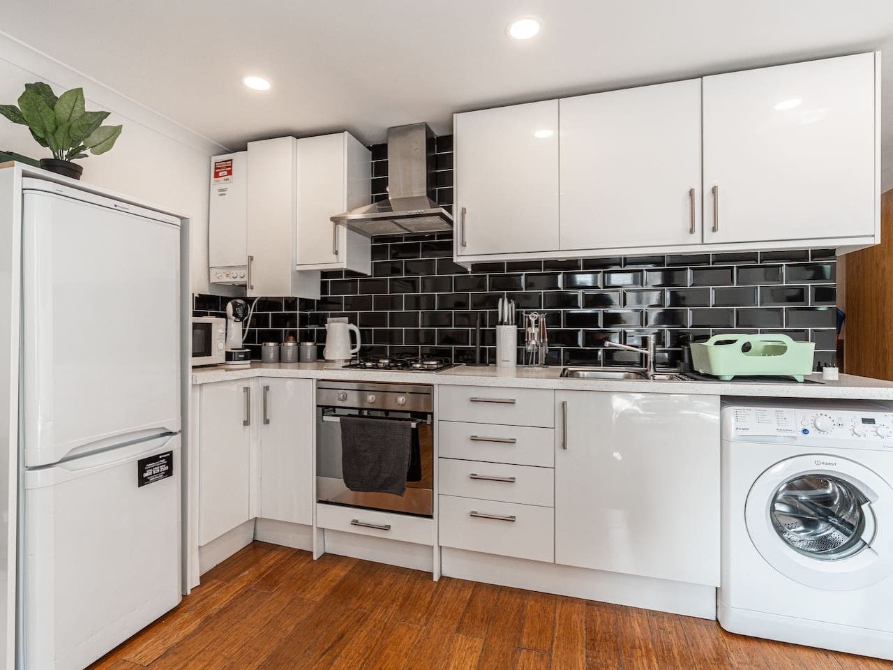 Coffee/tea maker, fridge, microwave, oven
