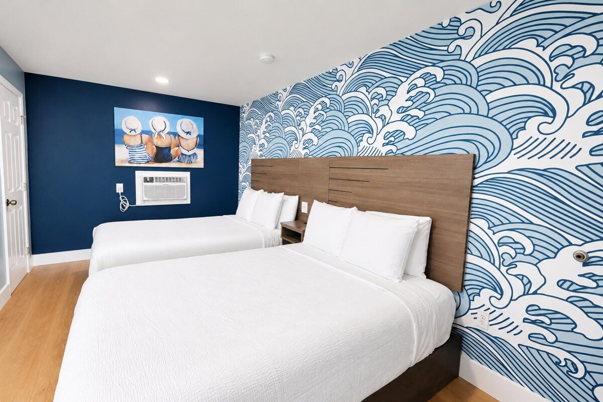 Room, 2 Queen Beds | Minibar, laptop workspace, iron/ironing board, WiFi (free)
