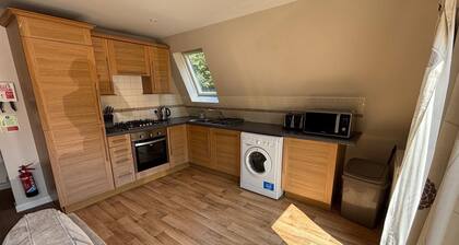 Cosy 2 bedroom A-Frame lodge with swimming pool, tennis court and lakes nearby.
