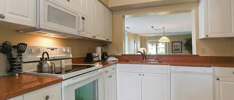 Coffee/tea maker, fridge, microwave, oven