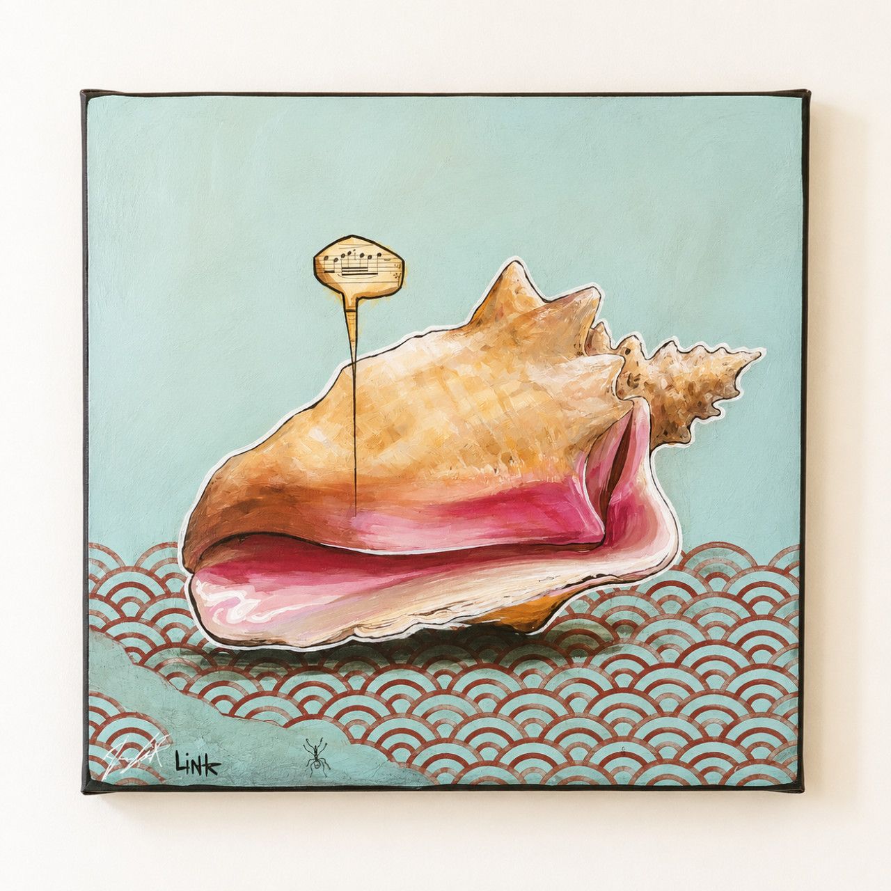 A framed artwork of a seashell with a tag, set against a background with a wave pattern.