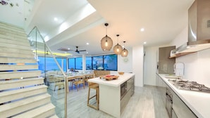 Private kitchen - "Villa by the Bay" with panoramic view of Samrong Bay and Koh Phangan island. (Chang Wat Surat Thani)