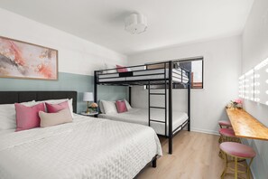 A room with bunk beds, a desk, and a vanity with lights. - House of Pearls Glam Stay on Music Row IG Worthy (Nashville)