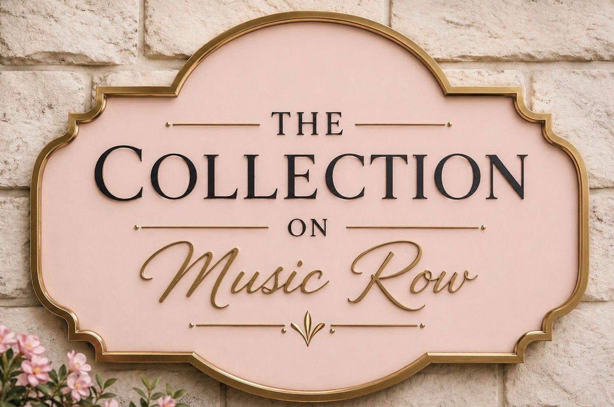 A sign with the text 'THE COLLECTION ON Music Row' against a textured wall.