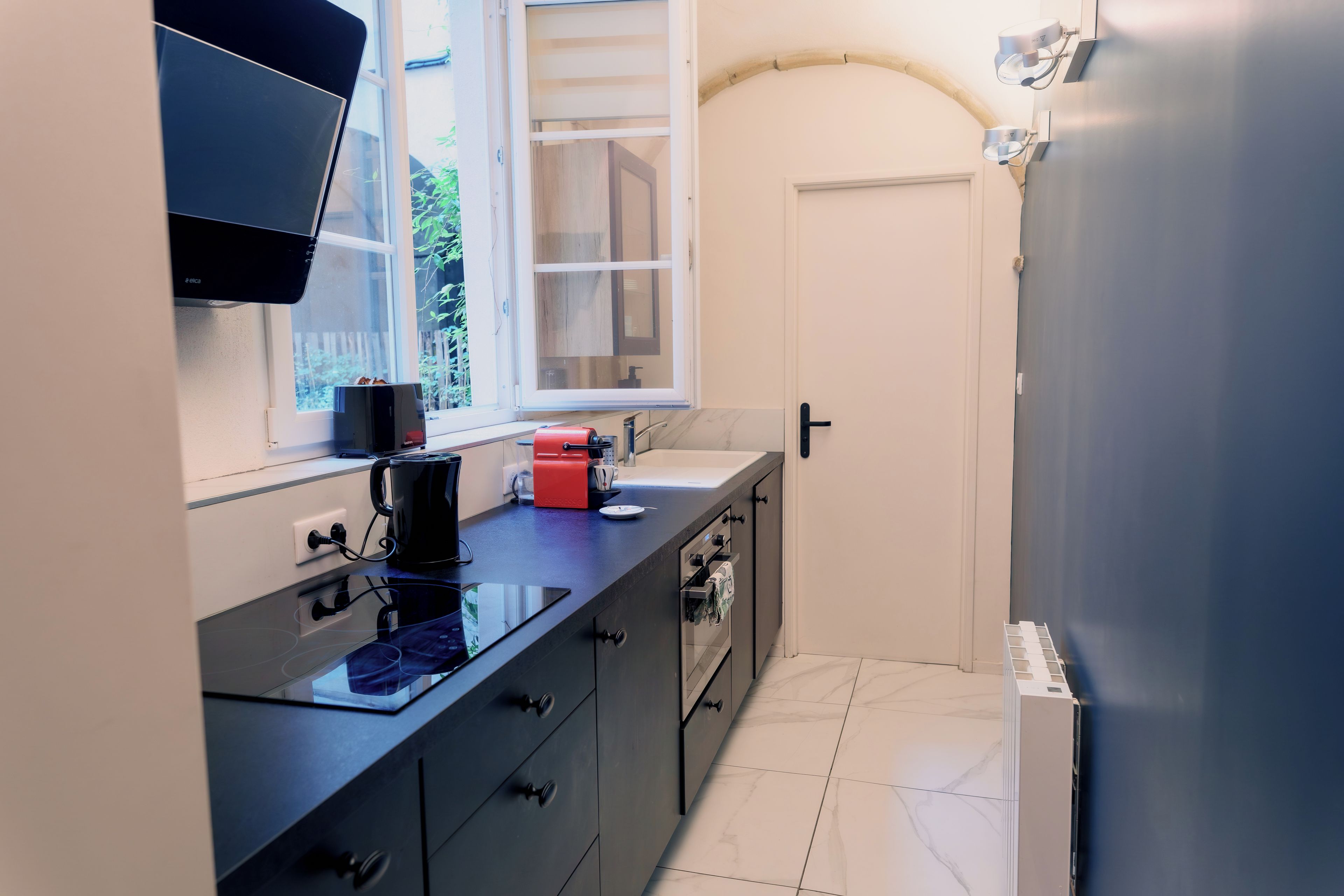 Coffee/tea maker, fridge, microwave, oven