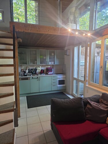 Charming garden cottage with open gallery in Erlach