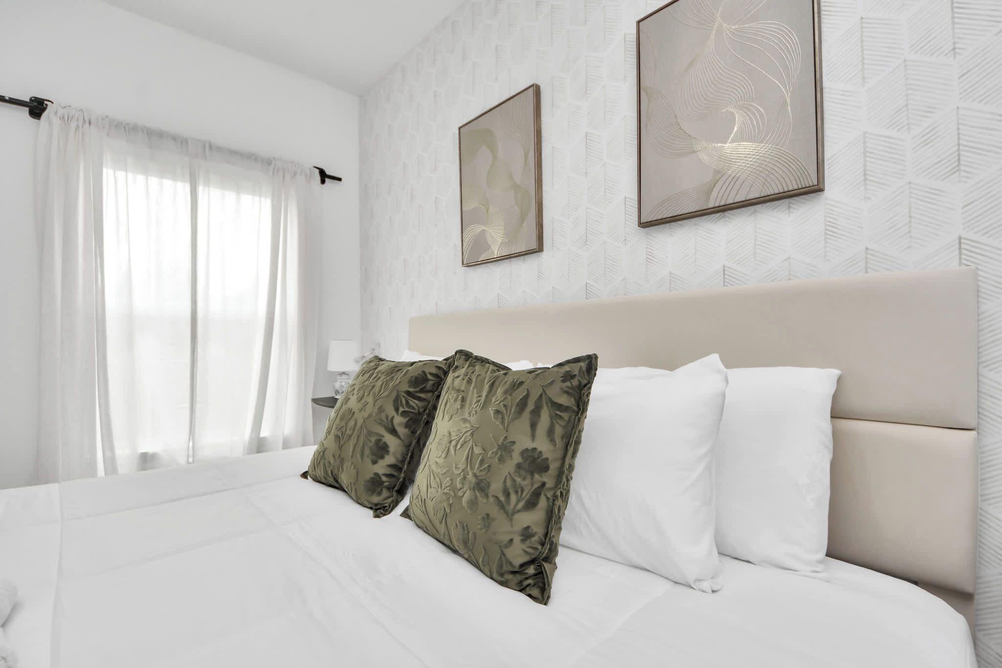 King bed with framed art