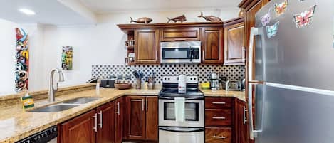 Coffee/tea maker, fridge, microwave, oven