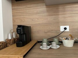 Estúdio conforto, sacada, vista para a cidade | Parte interna