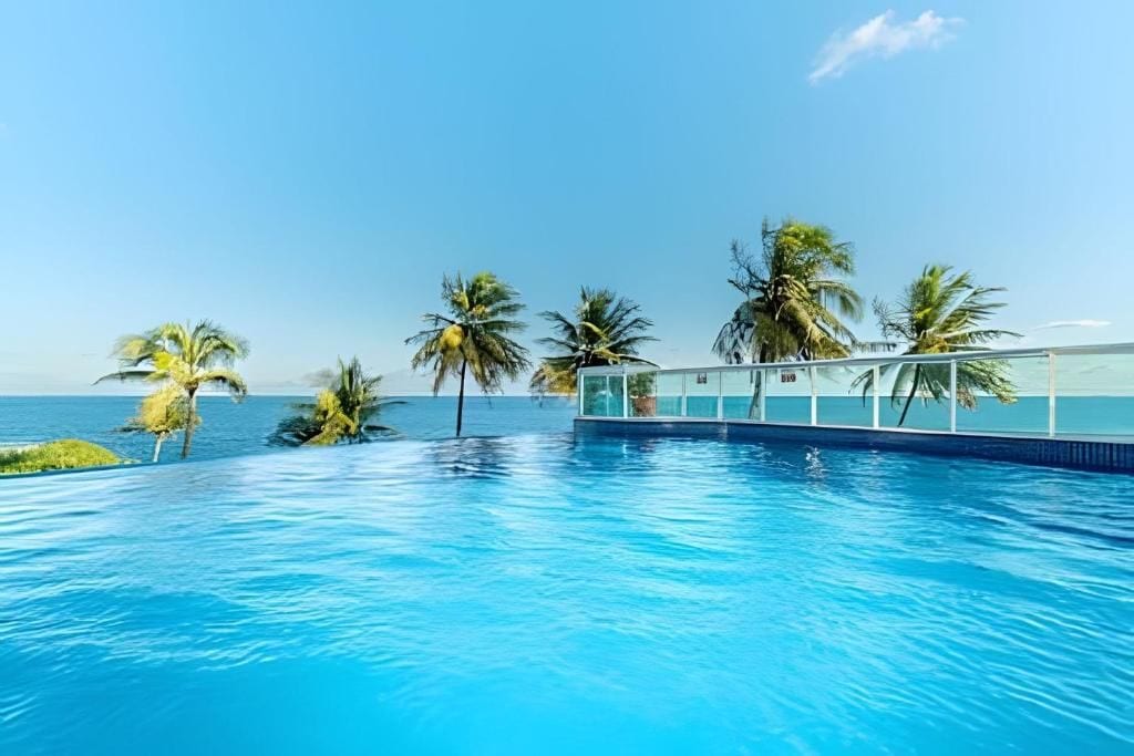 Departamento, vista al mar | Alberca | Alberca al aire libre 