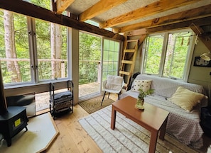 Living area - Rustic creek side cabin in the woods (Granville)