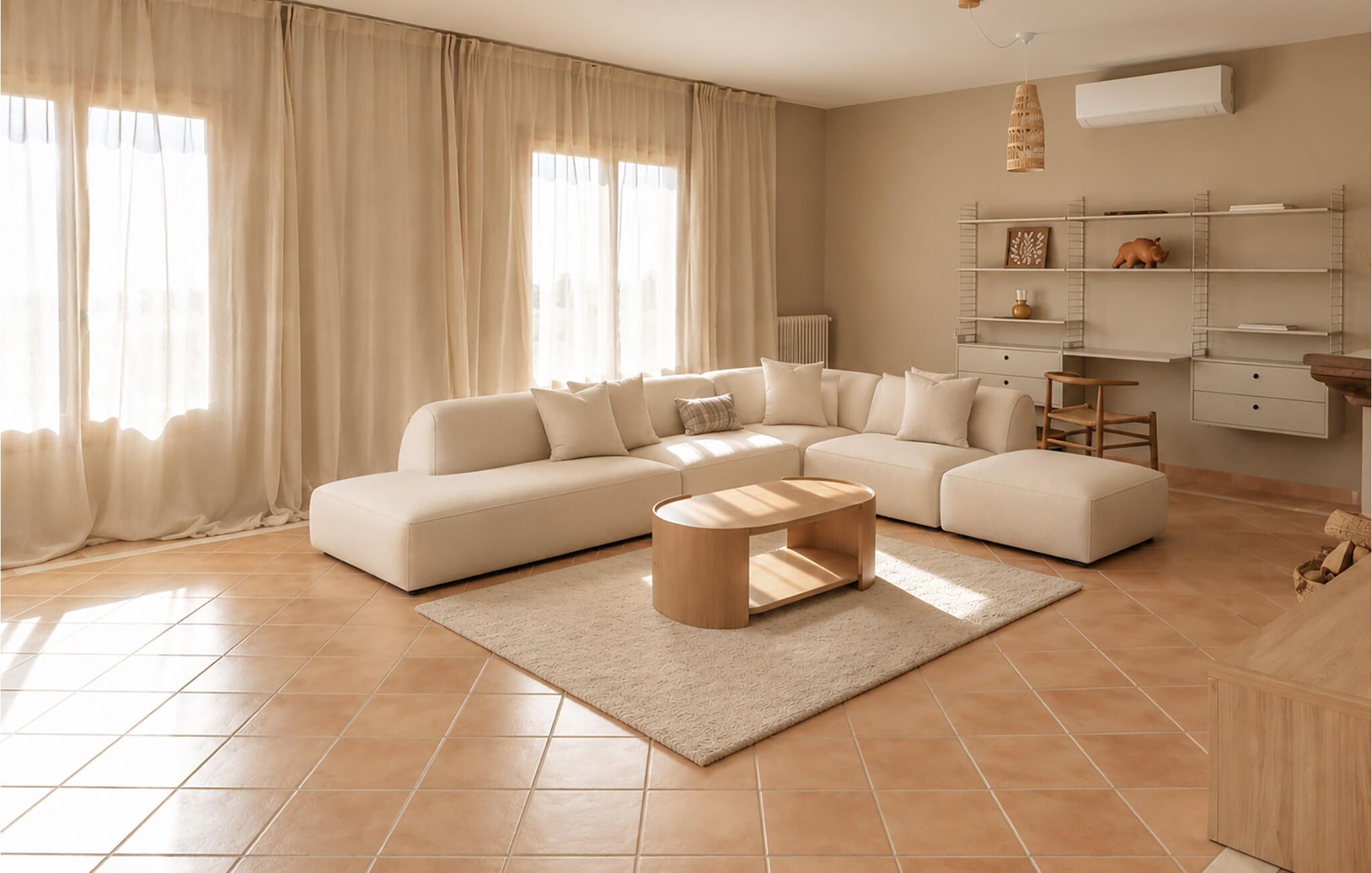 Una sala de estar moderna con un sofá modular, una mesa de centro y una estantería en la pared.