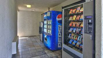 A vending machine area with a Pepsi machine and a snack vending machine.