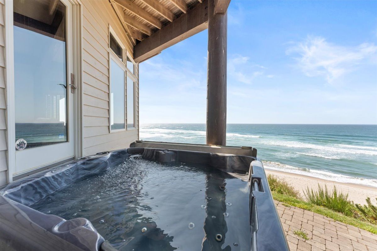 Ocean View Hot Tub: Soak in bubbles while admiring stunning beach vistas right from your retreat!