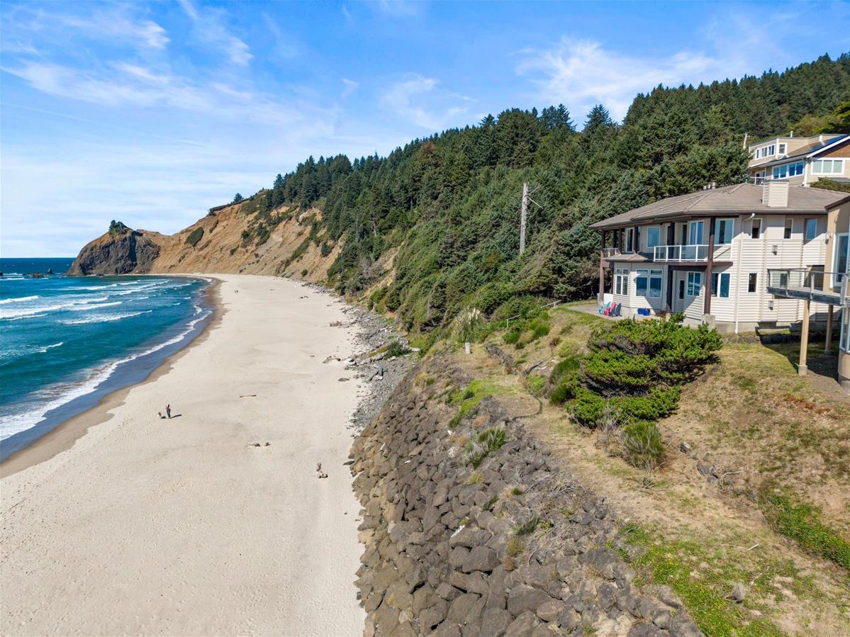 Oceanfront Escape: Breathe in the sea air from your deck, just steps from golden sands!