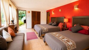 A hotel room with two beds, a sofa, a desk, and a view of the outdoors. - Sparrow | King and Breakfast in the Woods (Valle de Bravo)