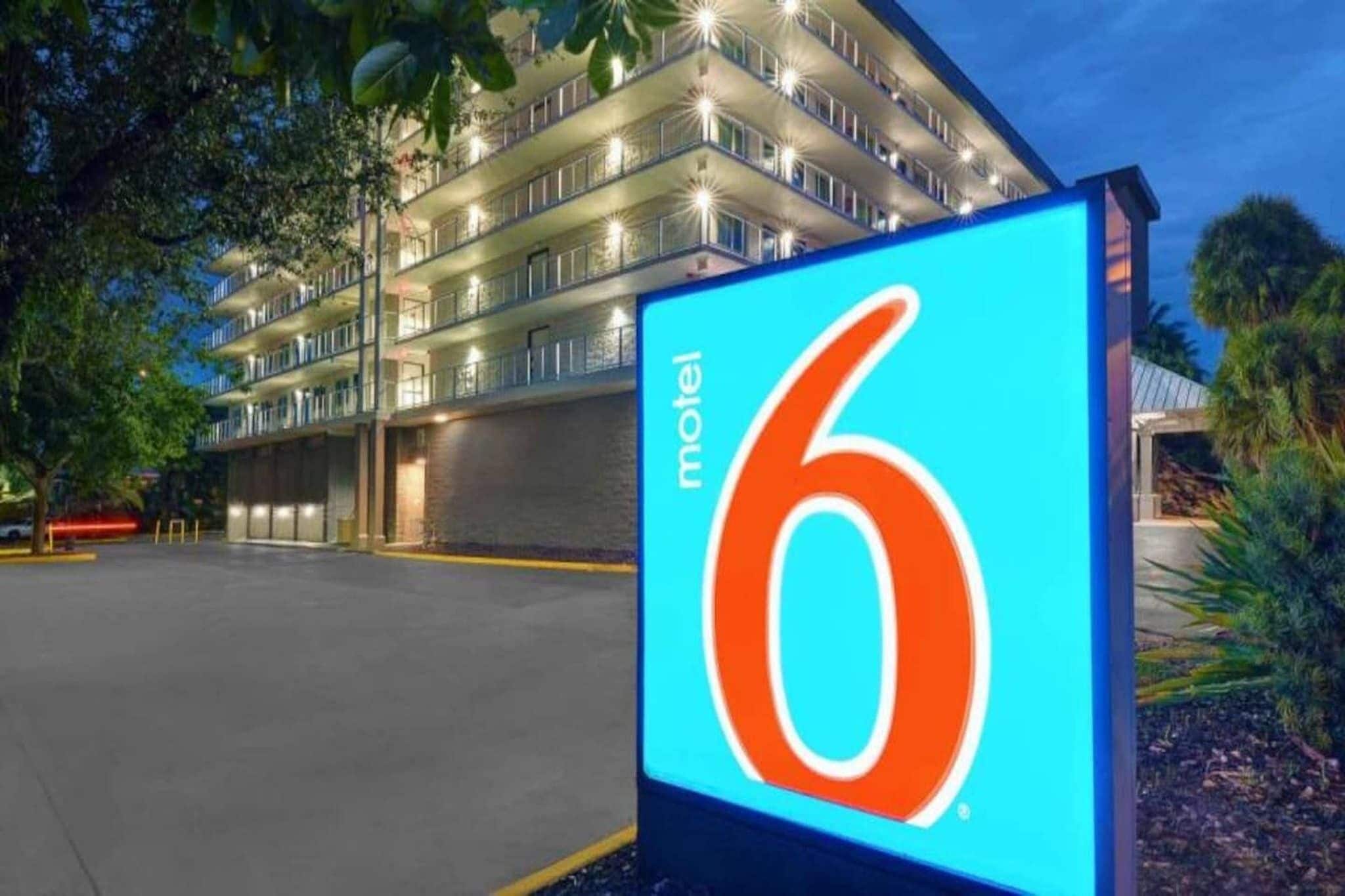 A motel sign with the number 6, indicating the establishment's name.
